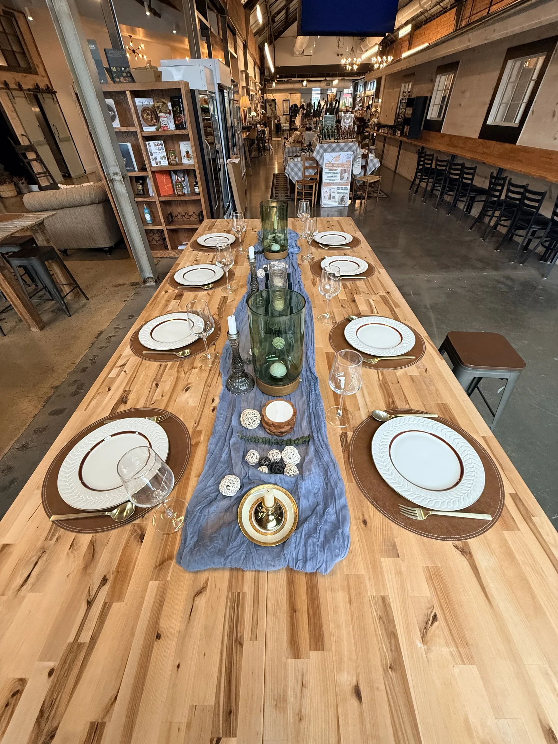 A long table set for a private event at Sobremesa